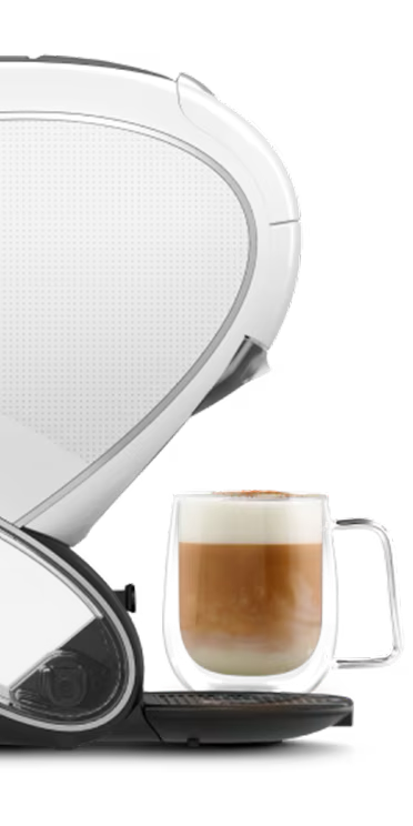 Comparativa entre una cafetera NEO Latte blanca y una cafetera NEO Caffè negra. El dedo de un alienígena duda entre las dos.
