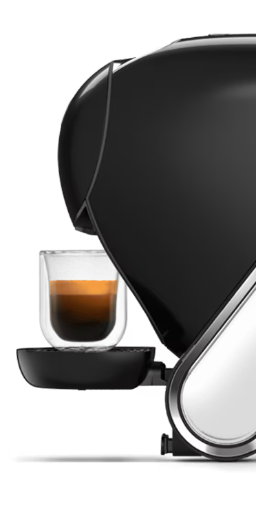 Comparativa entre una cafetera NEO Latte blanca y una cafetera NEO Caffè negra. El dedo de un alienígena duda entre las dos.