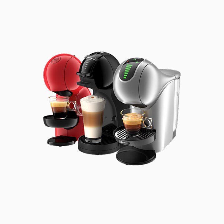Una cafetera Piccolo roja, una cafetera Mini Me negra y una cafetera Genio S Touch gris